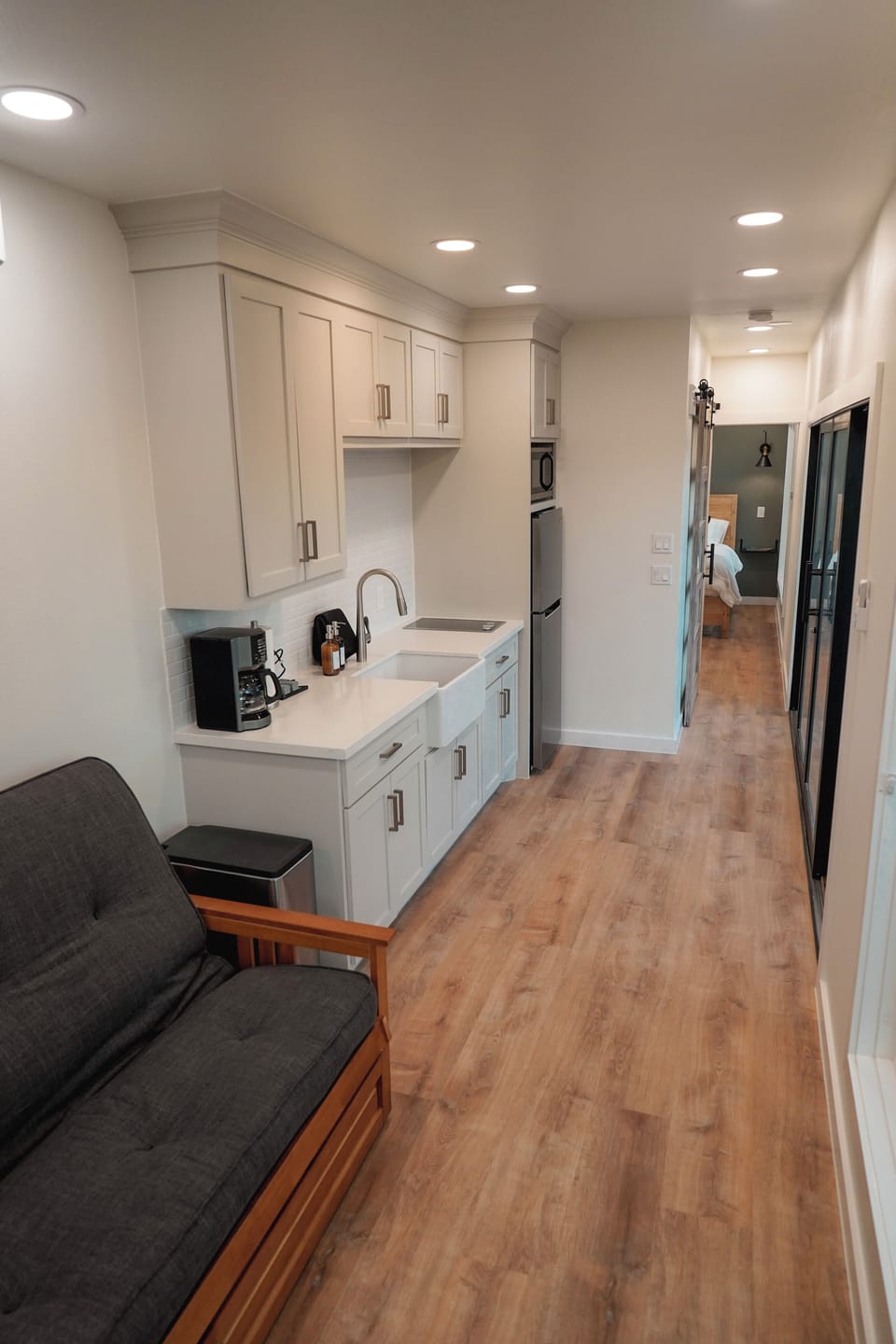Container 2: Kitchen with coffee machine, fridge, and microwave included