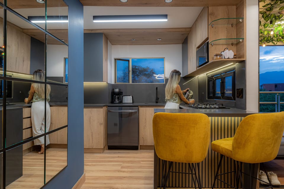 slow-closing cabinets, a large dishwasher, quality cutlery and internat. brands