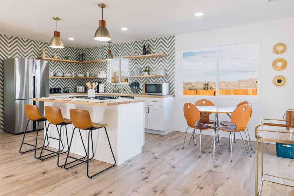 Full amenities kitchen with refrigerator, microwave and toaster