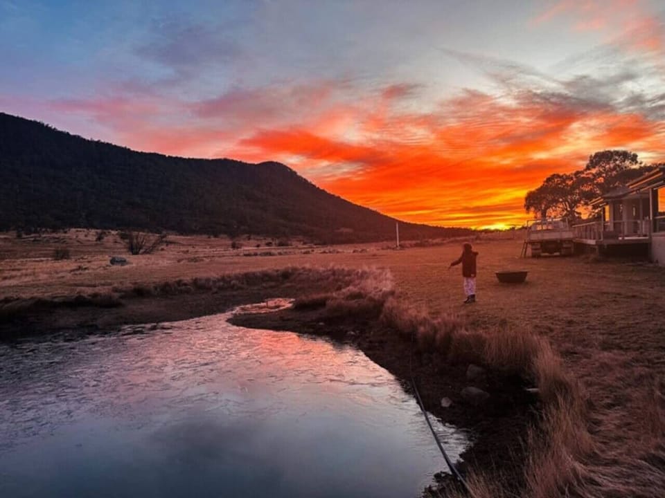 SUNRISE OVER DAM