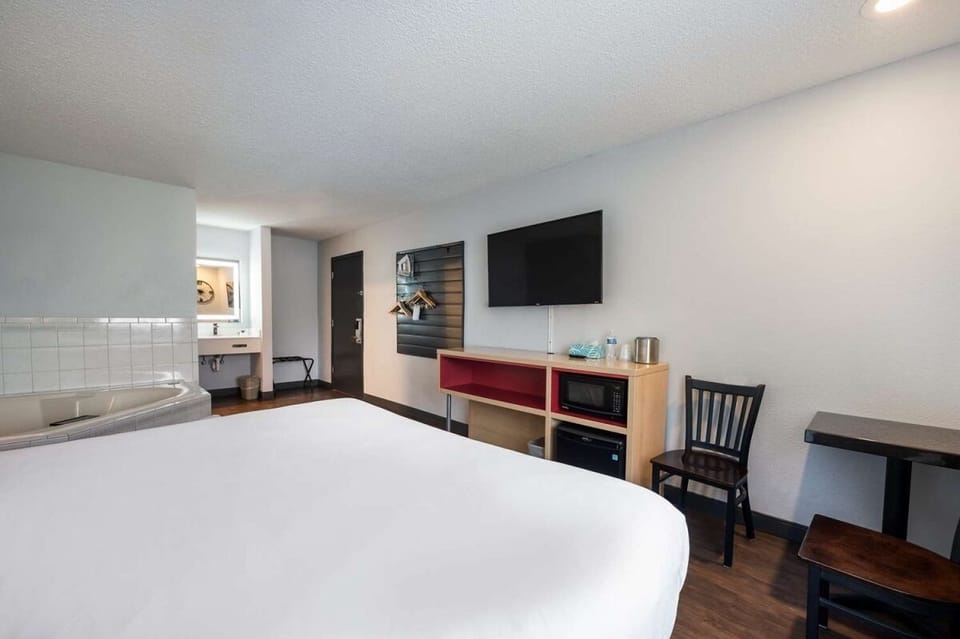 Settle in with convenient vanity space and cozy seating.