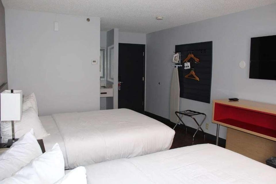 Share the space comfortably with two beds and convenient storage