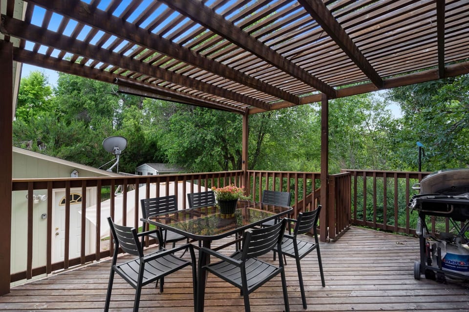 Elevated Deck with Pergola and Outdoor Dining Area