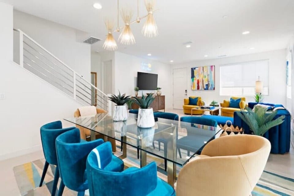Living/dining room and kitchen, open concept with sliding glass doors to patio.