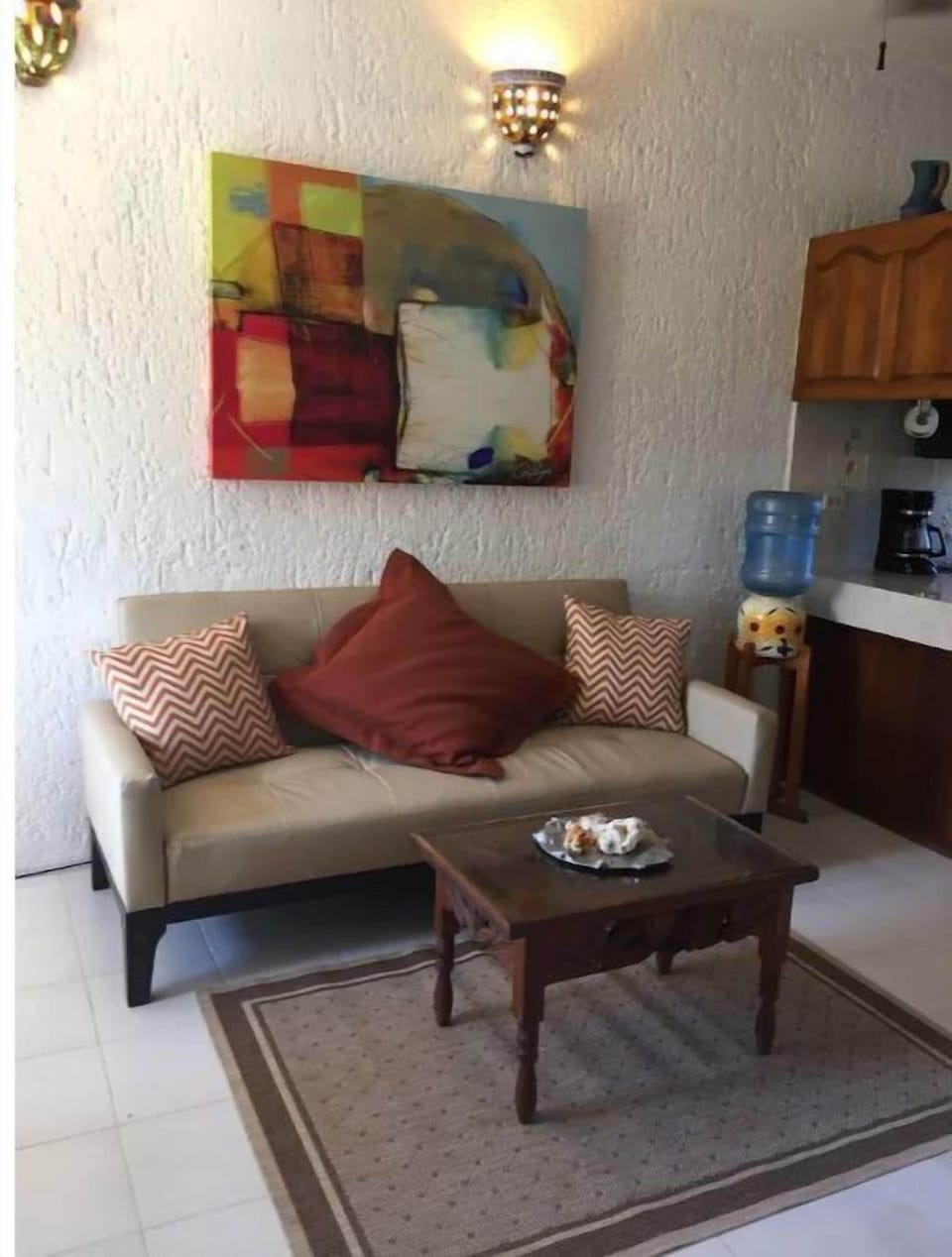 Living room with couch and separate TV area