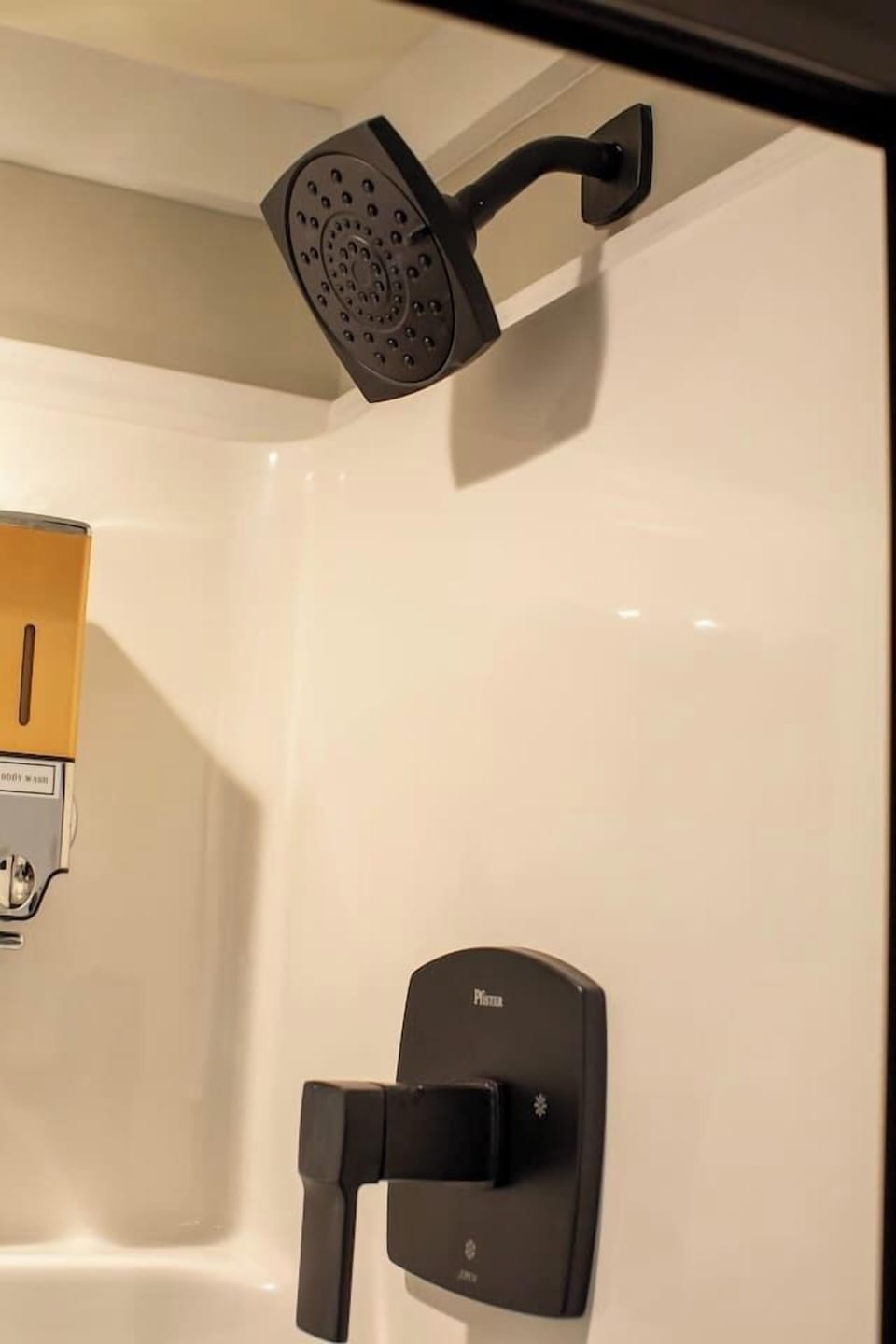 Sleek black shower fixtures.