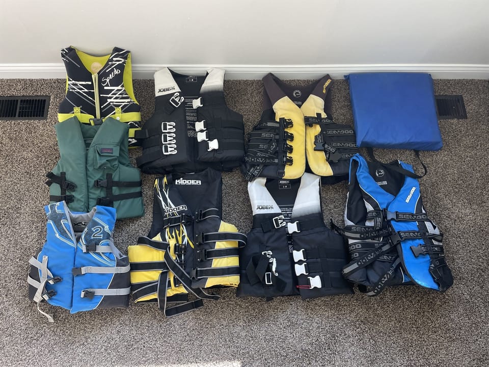 3 Youth and 4 adult life jackets