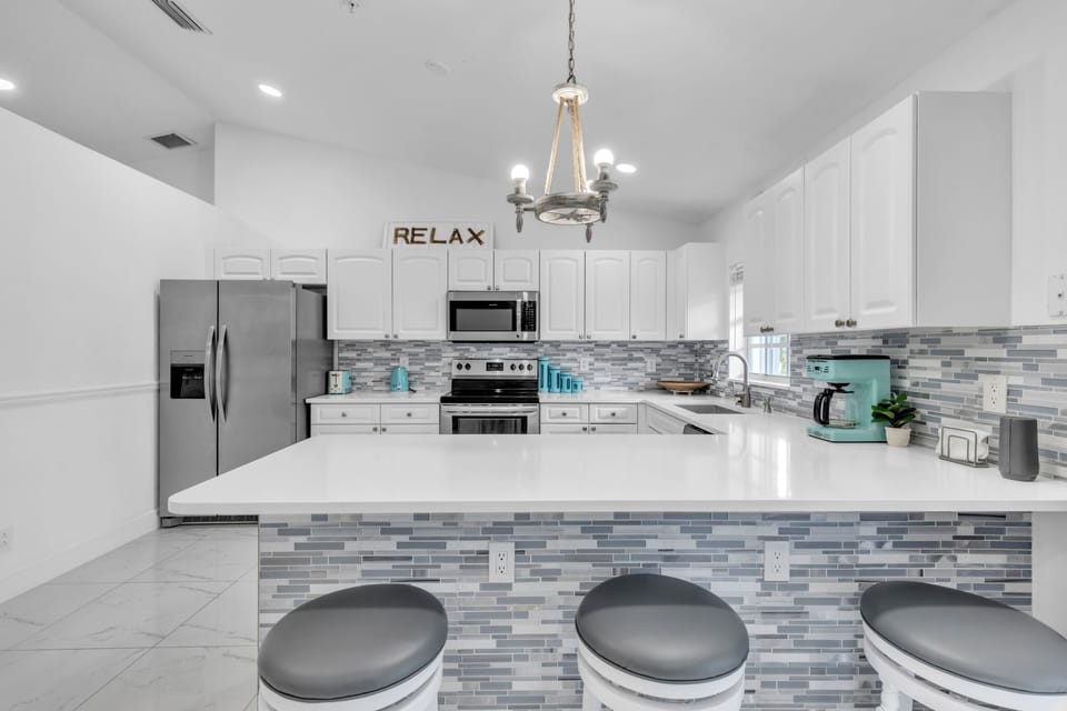 Indoors, Kitchen, Microwave, Refrigerator, Cooktop