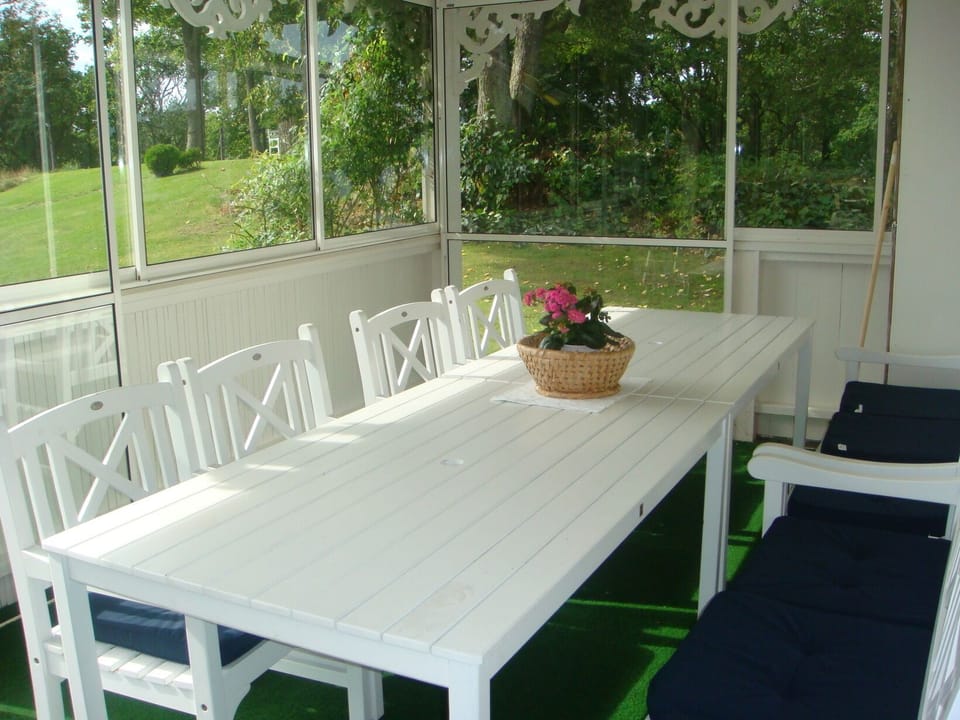 Veranda with dining table