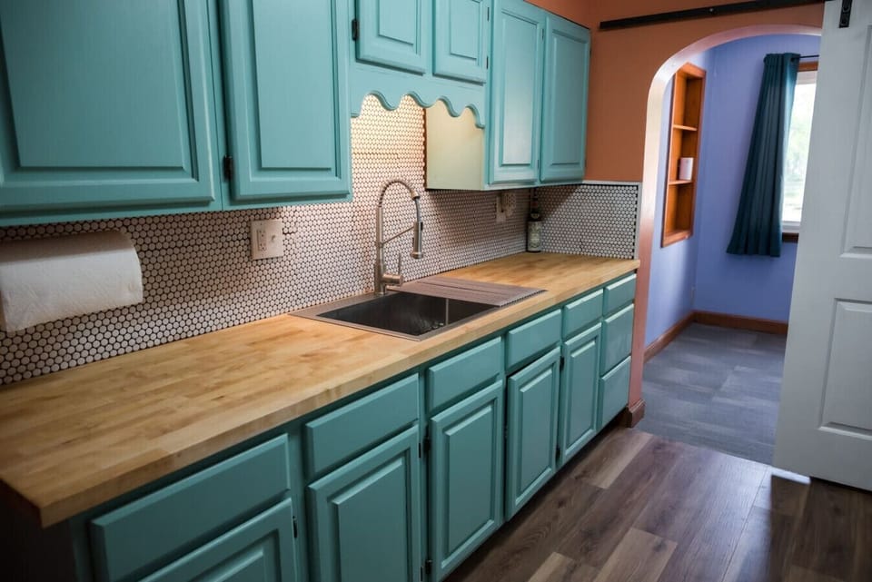 It also features a large single bowl sink, and access to the bunk bedroom