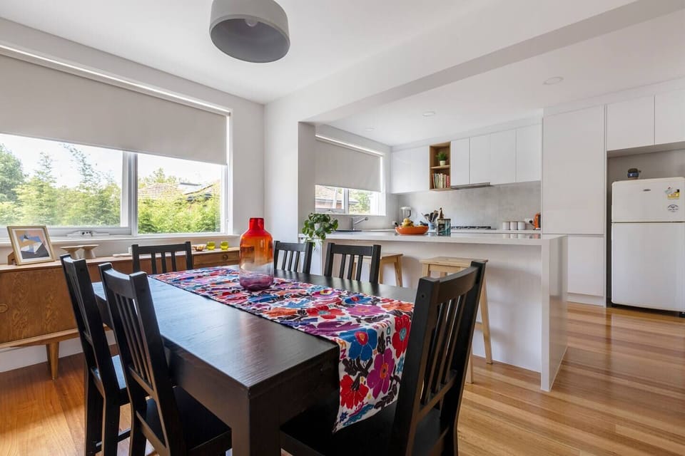 Staying in for the night? Cook up a storm and enjoy it around the timber dining table for up to six guests.