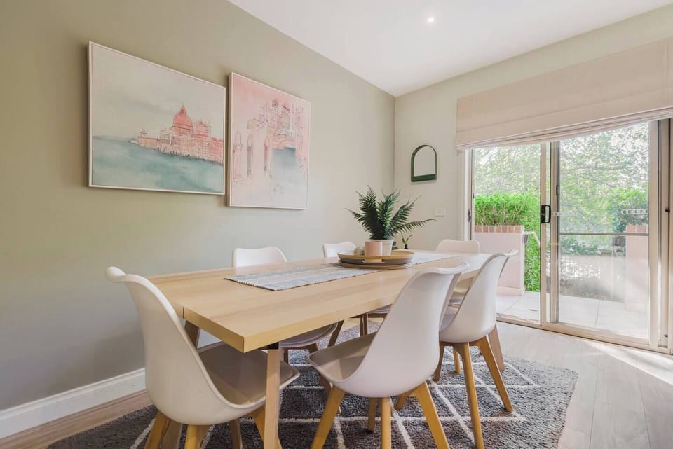 Enjoy a delicious home cooked meal at the six-seater wooden dining table large enough for the whole family.