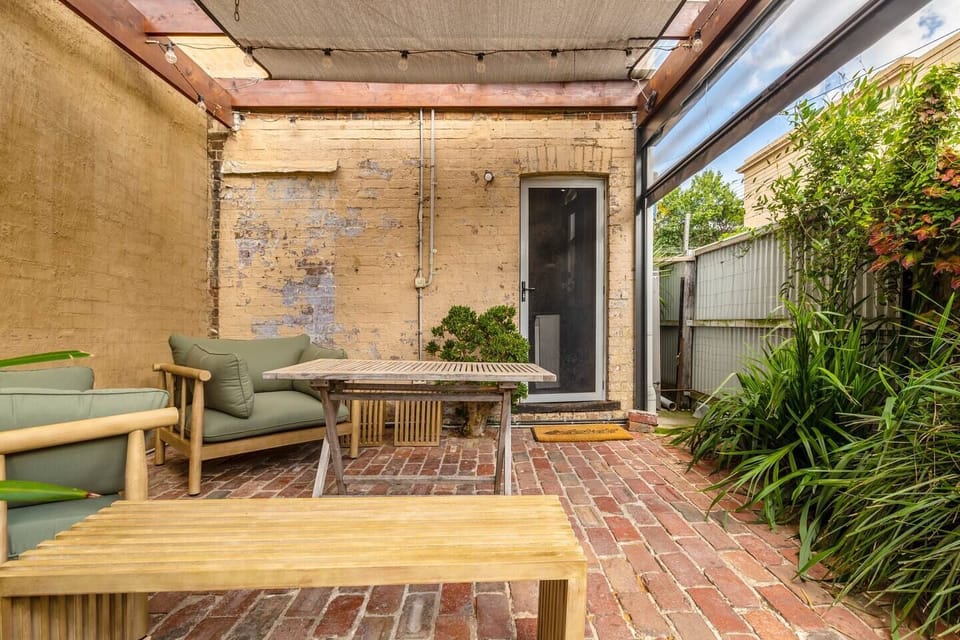 Enjoy some fresh air out in the courtyard with a BBQ and comfy alfresco seating.
