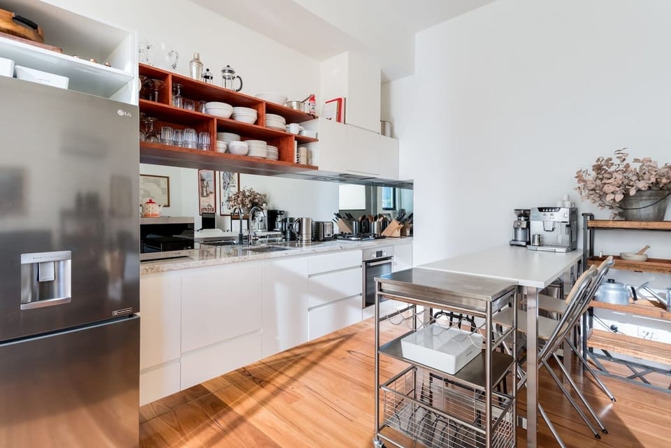 The kitchen is fully stocked with everything you'll need to cook meals at home.