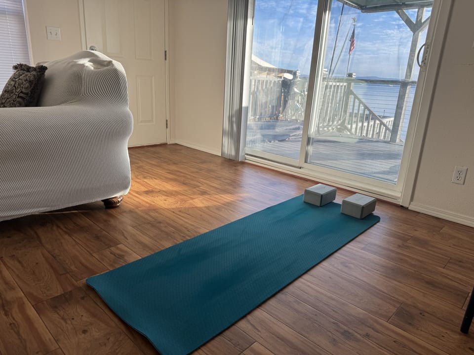 Yoga mat available for guests for a morning stretch and meditation by the lake