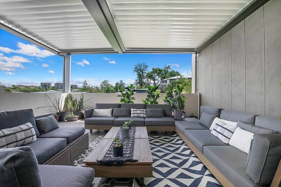 The private balcony provides plenty of space for both relaxing and entertaining.
