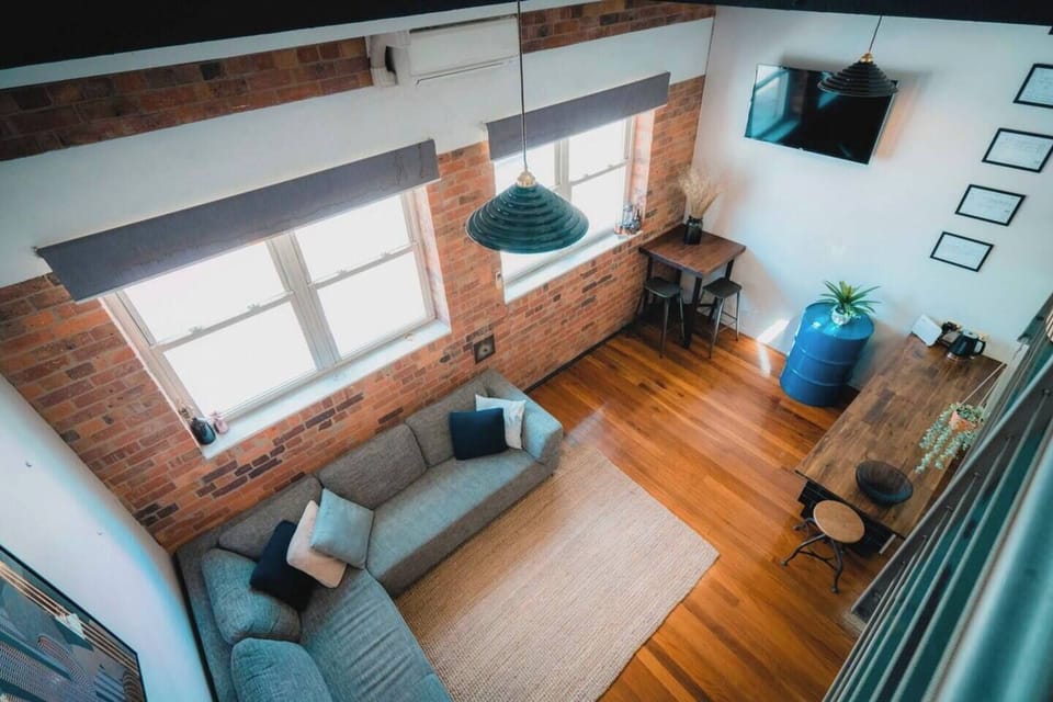 Relax and unwind in the bight open living area with a plush L-shaped lounge situated in front of the HD TV.