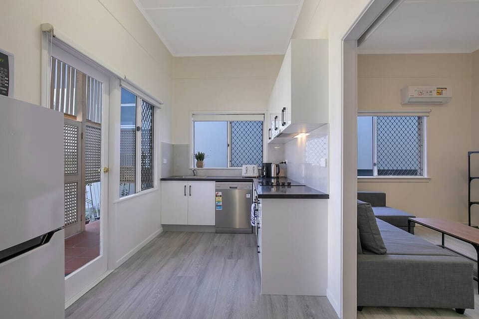 The kitchen comes equipped with up-to-date appliances and generous counter space, perfect for creating your own meals at home.
