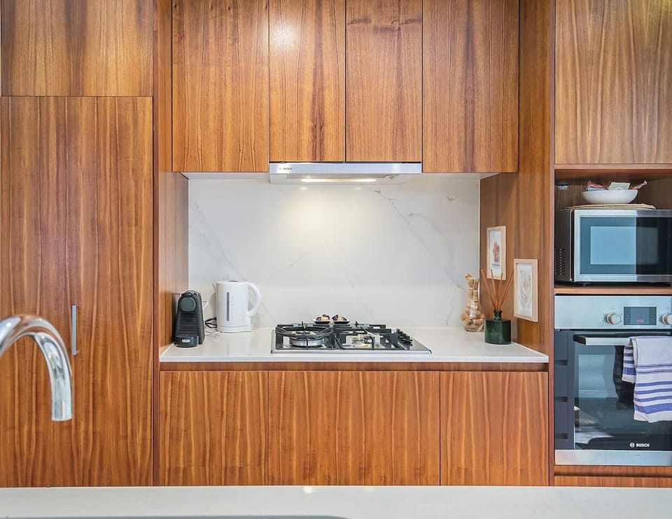 Luxury finishes and fixtures adorn the gourmet kitchen, beckoning you to test your culinary skills in style.