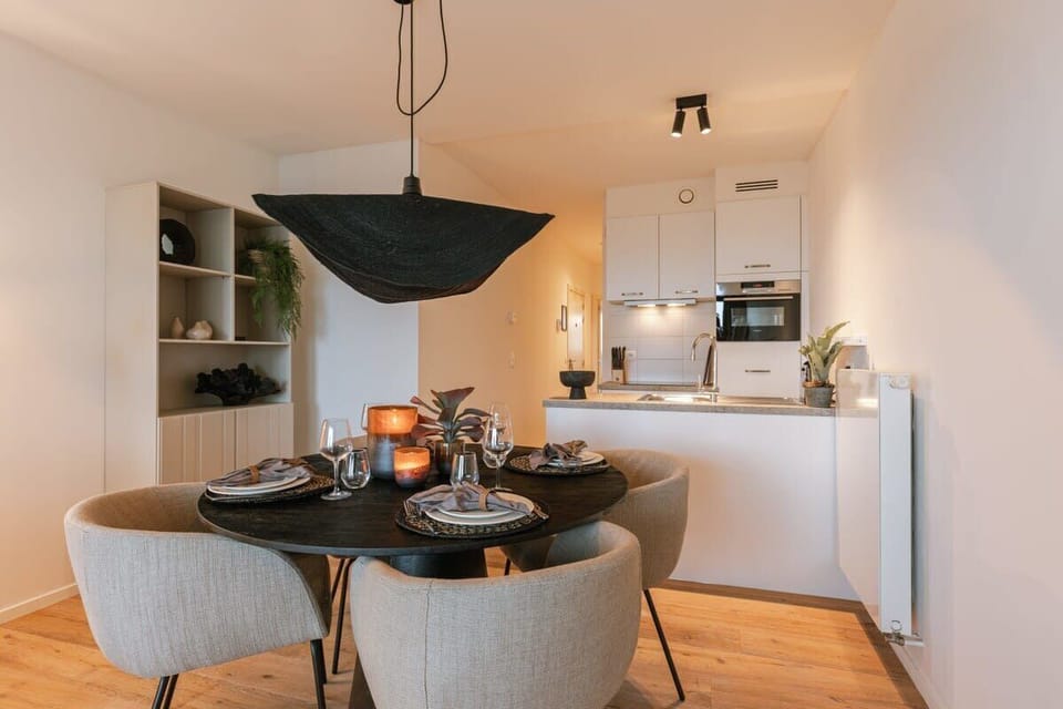 Dining table with open kitchen