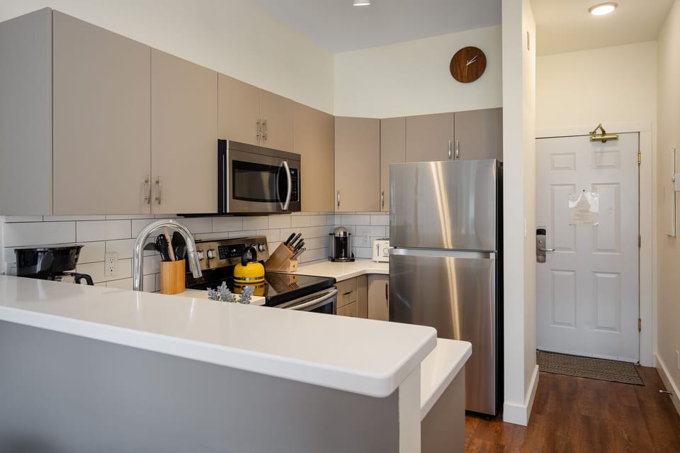 Granite countertops and modern fixtures give this kitchen a clean, updated feel.