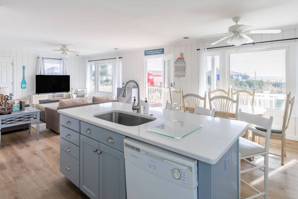 View of Kitchen leading to family sitting area