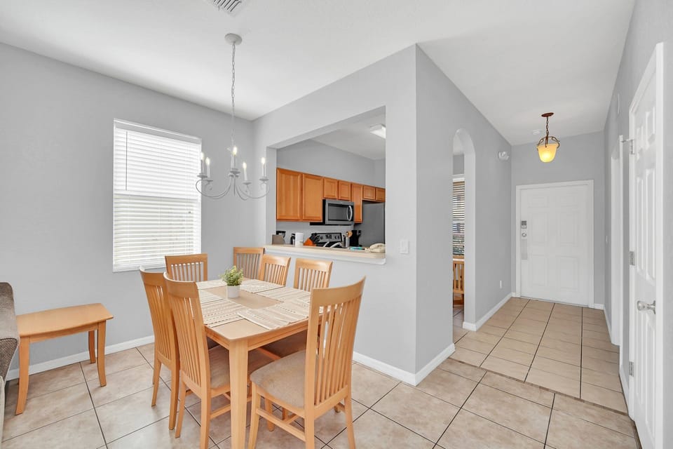 A cozy dining nook with seating for four, perfect for casual meals.