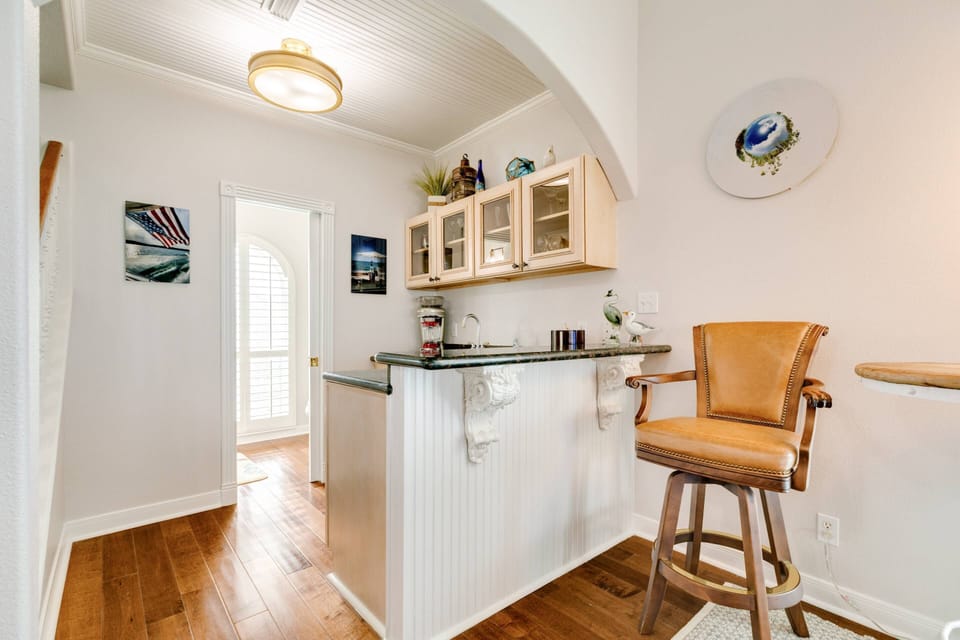 Wet bar complete with sink, Blender and cocktail glasses