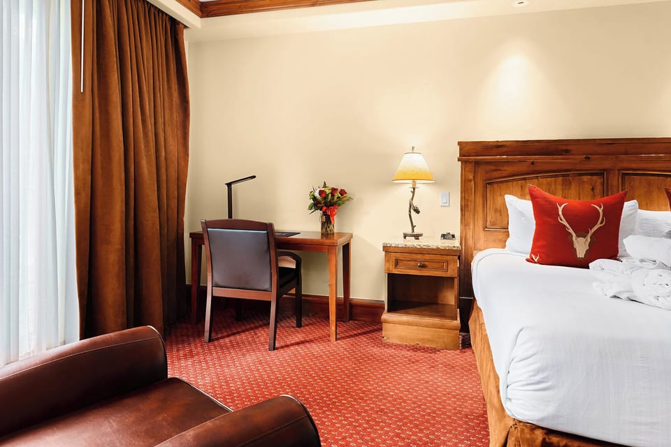 Unwind by the window with a quiet work nook.