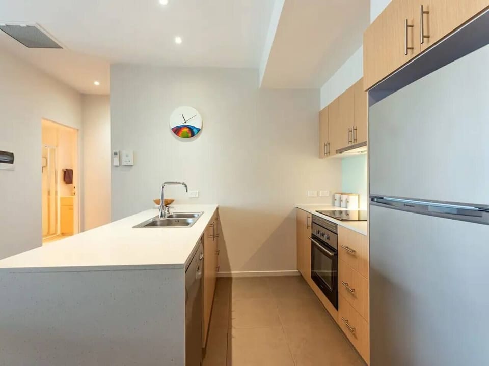 Whip up delicious meals in the open-plan kitchen, perfect for both gourmet cooking and quick snacks.