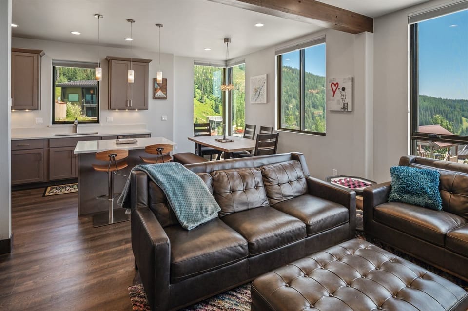 Open family room with mountain and lake views.