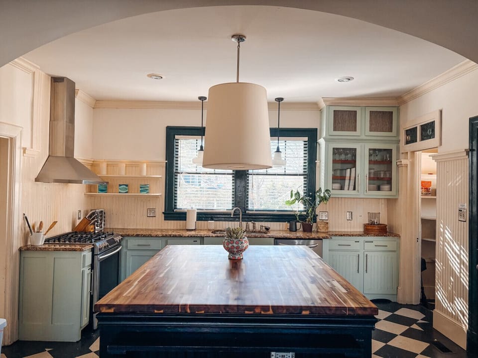 Kitchen equipped with: microwave, dishwasher, gas range, toaster, pots, pans, spices, dinnerware, glasses, wine glasses, cooking and eating utensils, walk-in pantry, and more!