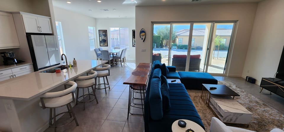 kitchen with ceaserstone countertops, dining g room and living room