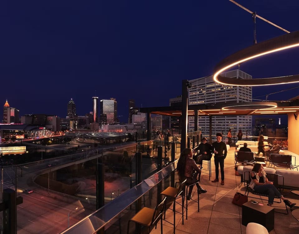 Soak up dazzling city lights from the buzzing rooftop terrace.