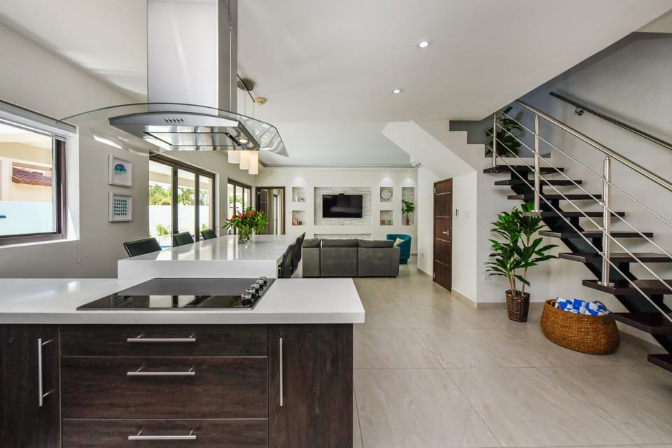 Open-concept kitchen, dining and living room area