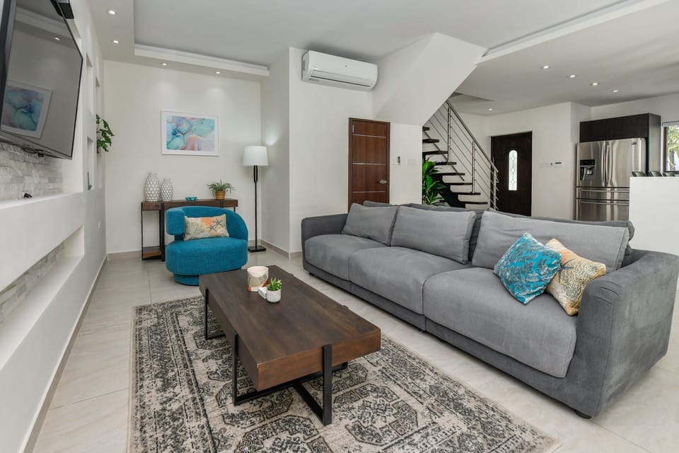 Living room with smart TV, cable, and streaming apps preloaded