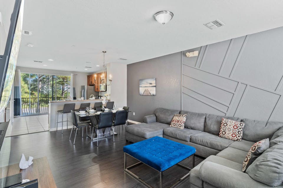 Living room with foosball table, electric fireplace and Smart TV