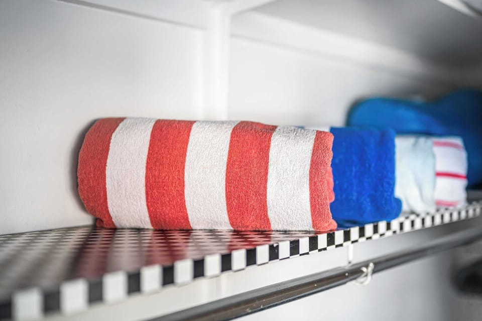 4 beach towels, 4 beach chairs and a beach wagon can be found in 2nd bedroom closet.