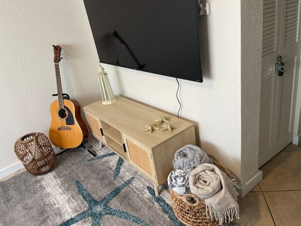 After sun, sand and sea relax watching your favourite movie on our 65inch smart tv.