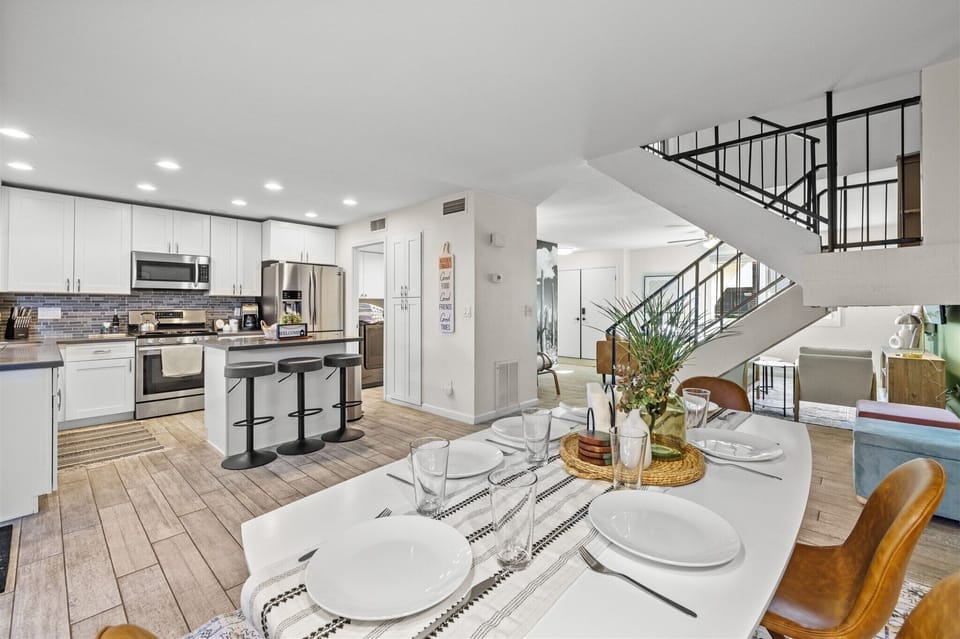 Bright and open kitchen layout into dining room area to enjoy your meals