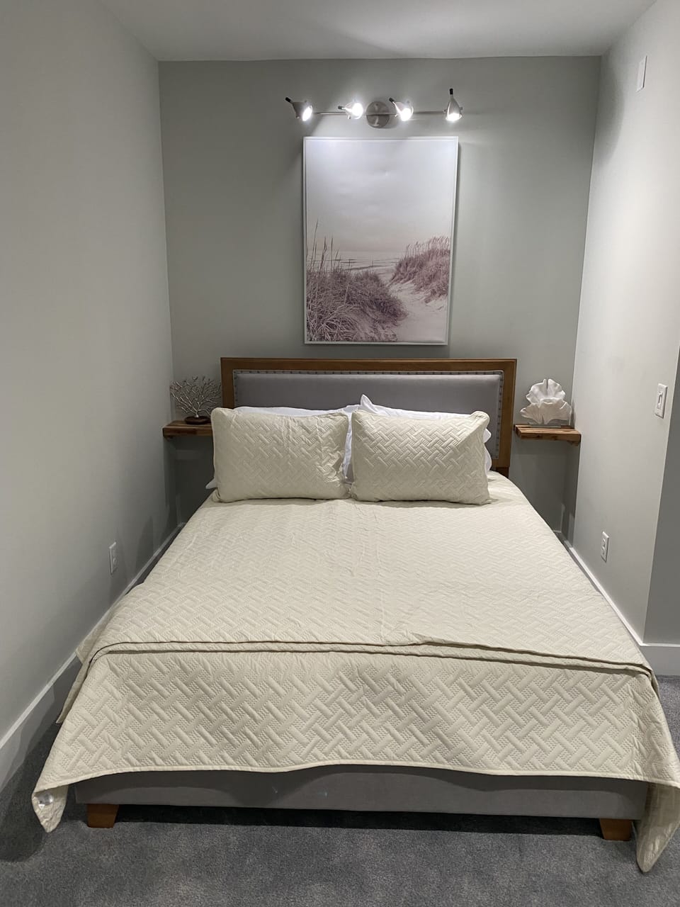 Feel privately secluded in the Queen Bed while watching TV on the swivel!