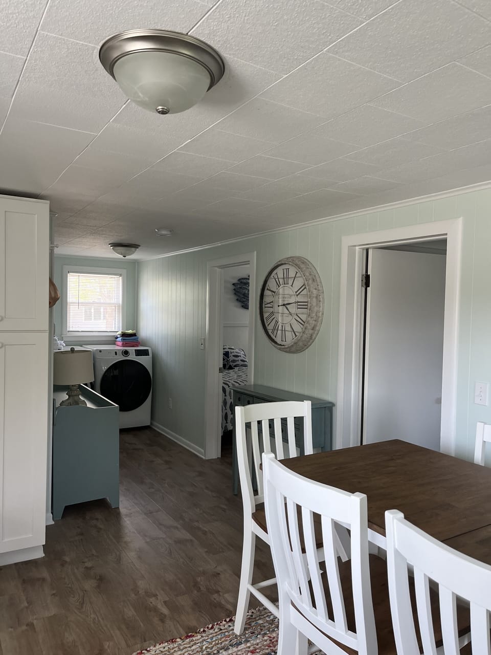Kitchen area and laundry area.