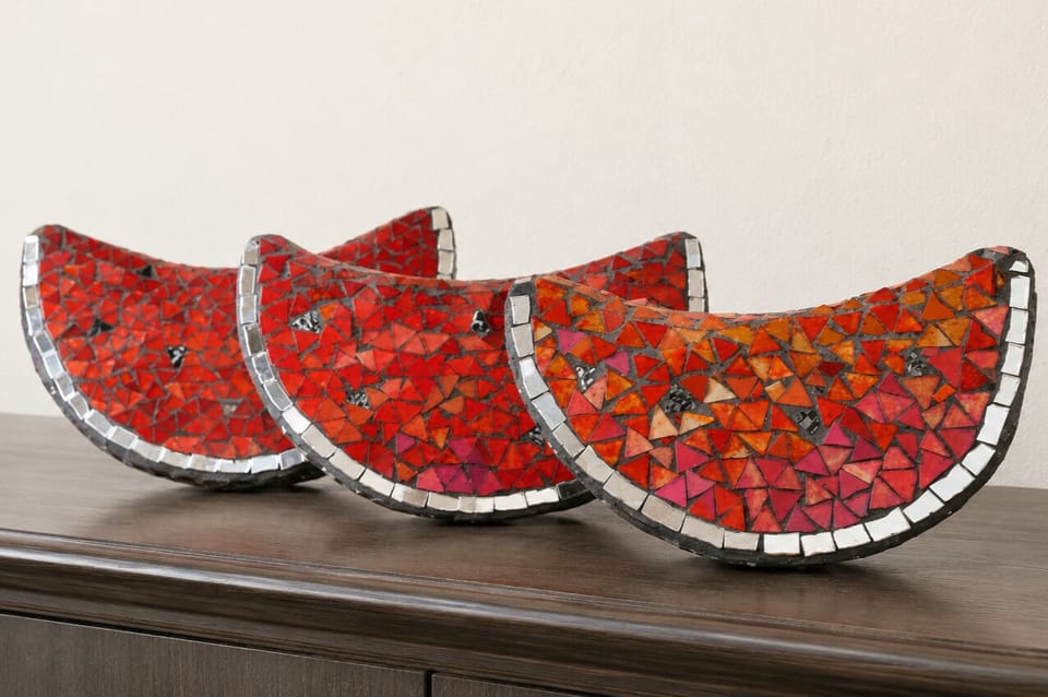 Mosaic watermelon slices on wooden console