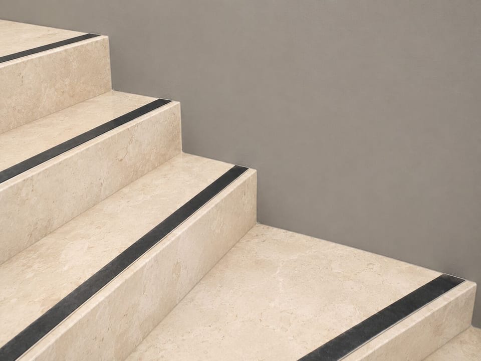 Modern stone staircase with sleek accents