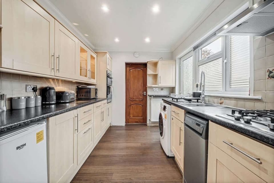 Cook, clean, and feel at home – the kitchen comes fully stocked with all the essentials, including a washing machine