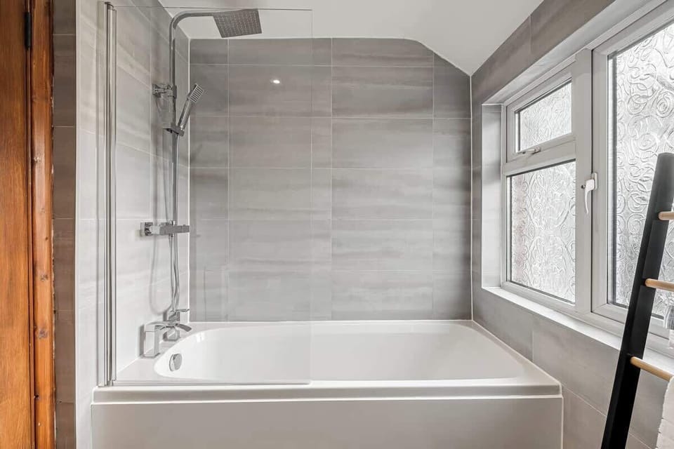 Thoughtfully designed with a full-size bath and overhead shower for a relaxing soak or a refreshing rinse