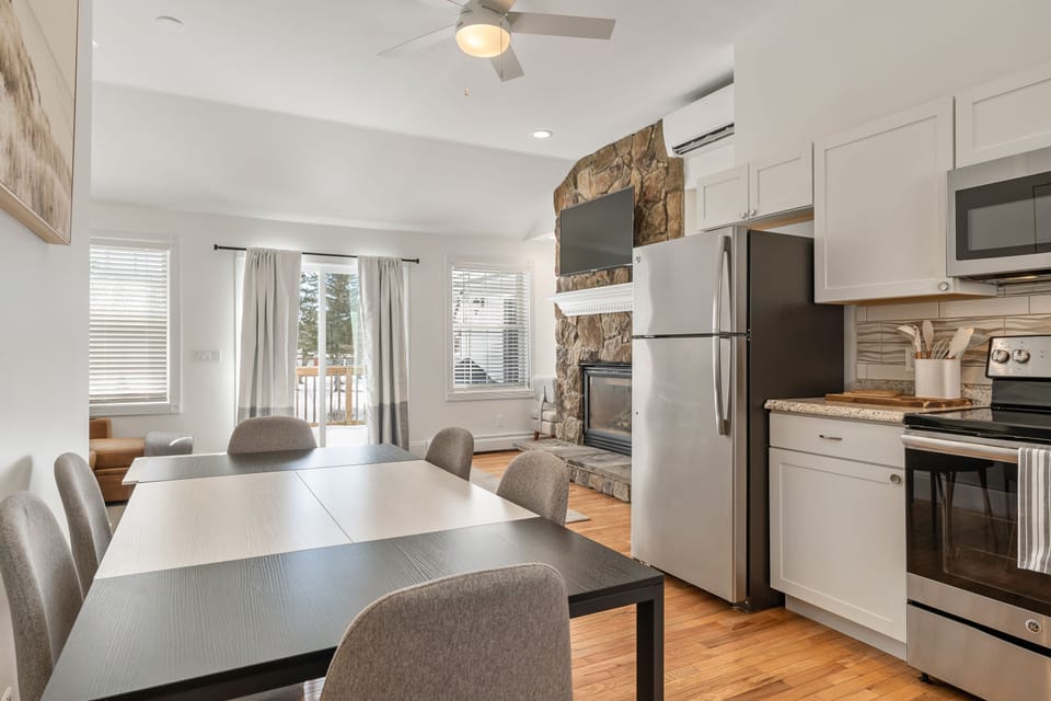 Stainless steel appliances, including a refrigerator, microwave, dishwasher