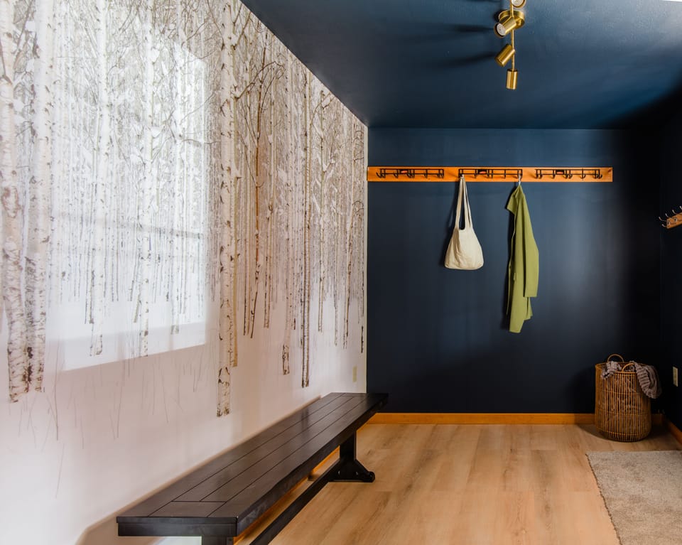Step into the mudroom with a brand new floor-to-ceiling mural,.