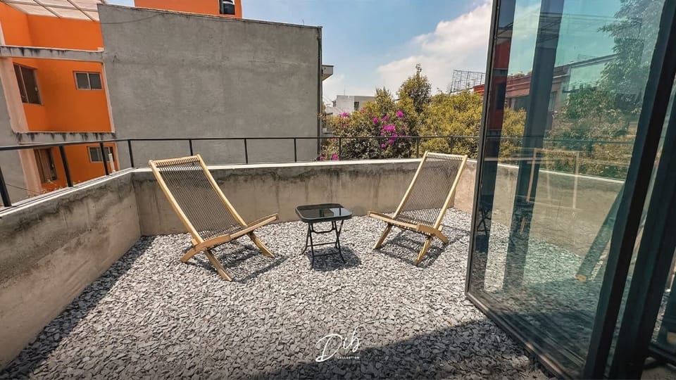 Your rooftop terrace is perfect for morning coffee or evening drinks under the Mexico City sky.