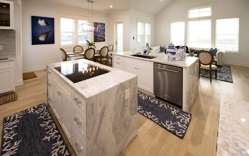 Large custom kitchen with 2 islands and 4 stools 